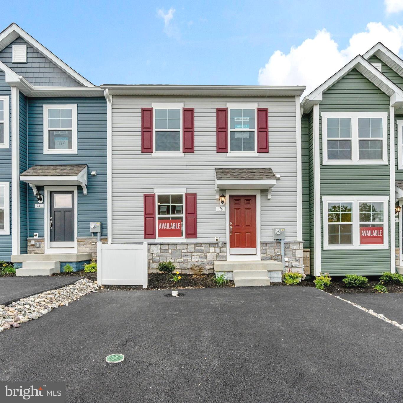 **Open House Parade of Homes this Friday August 1st from 3-6 and Saturday August 2nd from 11-3. Tour 6 completed homes available for immediate move in. Qualified buyers are eligible for special financing and generous closing assistance. Looking to move later this year? Information on townhomes that can settle in September or November will be available**
*OFFERING UP TO 18K IN CLOSING COST ASSISTANCE FOR PRIMARY RESIDENCE WITH USE OF APPROVED LENDER AND TITLE!*
MOVE-IN READY! Tired of stairs? Main level entry townhome with 4 car parking pad features private views off back of home. Meet the York II with 4 car parking pad. Enjoy entering your home on the main level with no stairs to carry your groceries. Main level features completely open floorplan with durable waterproof luxury vinyl plank flooring. Kitchen features 8.5 ft. Desert Silver Quartz prep island with undermount single bowl sink and garbage disposal. Beautiful White full overlay kitchen cabinets include luxurious 42" upper cabinets reach to the ceiling. Kitchen is brightly lit with LED lighting and 2 pendant lights for island. Modern Stainless Whirlpool appliance package includes a French door fridge with filtered water and ice dispensing, range, dishwasher, and microwave with exterior vented exhaust fan. Pendant lights with seeded glass globes, cabinet pulls, and goose neck kitchen faucet with pull down sprayer are all brushed nickel finish giving this kitchen a beautifully coordinated palate. Plenty of storage with a 5 shelf pantry, 5 drawers and plenty of cabinet space. Sliding glass door offers easy access if a deck is added to the home. Family room has prewire for internet/cable and 4 ceiling LED Lights and ceiling fan pre-wire. Convenient powder room with elongated comfort height toilet on main level and coat closet. Upstairs primary bedroom offers vaulted ceiling and ensuite bath with ceramic tub-shower combination, dual sink vanity and durable, waterproof luxury vinyl plank flooring. White cabinets with brushed nickel pulls and LED lighting above each sink. Elongated comfort height toilet included. Walk in closet and ceiling fan rough in for primary bedroom included. Secondary bedrooms have ceiling lights on switches. Hall bath includes a ceramic tile tub-shower combination and a comfort height elongated toilet. Backyard features full sod and community allows privacy fences and up to 2 pets per household. Don't delay, make an appointment to review our most affordable home at Homestead Acres.