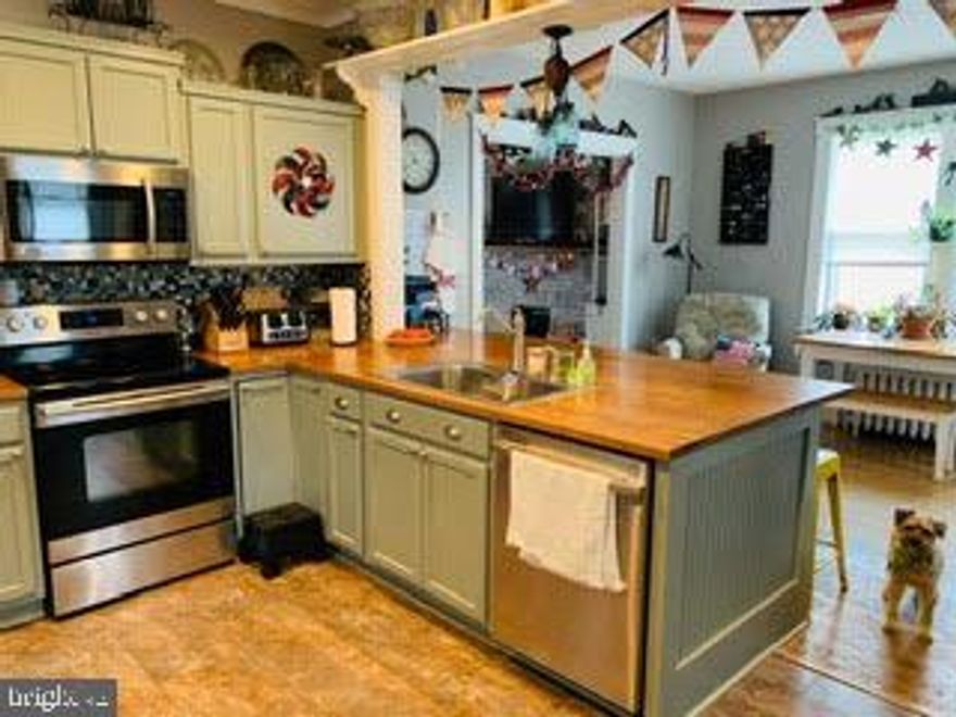 This charming home is located in an established family neighborhood on a quiet, one way North End street. The property sits beside an alley for easy access with an empty lot across the alley giving the home and yard a non-crowded feeling. The immediate neighbors have lived in their homes a long time, and they contribute to a very friendly neighborhood vibe. The home shows pride of ownership everywhere. In the 16 years the family has lived here, they have made steady and continuous improvements to the home.  In 2020, new engineered waterproof vinyl floors were installed in the kitchen and bathrooms, and the  bathrooms were upgraded. In 2019, the exterior was repainted and a new refrigerator and above range microwave were installed. Prior to that, new roofs were put on the house, porches, and garage, the electrical service was upgraded to 200 amps, the attic was converted into a great bedroom space, a half bath was installed on the first floor, main floor hardwood floors were refinished, and the kitchen space was completely reworked and made into a stunning work space.  The kitchen countertops are handmade of solid oak -- their gleaming surfaces perfectly set off this unique space. Much of the original woodwork remains in the home keeping the original feel and charm of the home alive. The upstairs bathroom features a claw foot tub with a shower. The smallest bedroom on the second floor has been converted into a walk in closet, but it could be used as a 4th bedroom. The yard is completely fenced which is great for children and pets! This property sits on a corner lot beside a through alley with an empty lot on the other side of the alley. It is within walking distance of Braddock Middle School, approximately a half mile from the Great Allegheny Passage, and just a short walk from a park down the street. The flower beds are nicely landscaped with 3 season blooming color. This home is a rare find! Don't delay in scheduling your showing appointment -- with all its attributes, this home will not last long on the market!