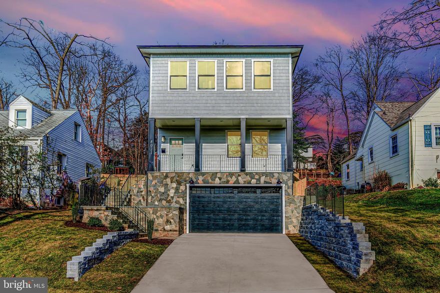 Stunning New Home presented by MSG Properties! There is still time to customize some of your final finishes! Delivery January 2022! This well-appointed home features thoughtful design and high-end finishes often overlooked in new homes and beautifully sits on over 10,000 SF lot and features a spacious 2 side car garage, 5 bedrooms, 4 full bathrooms, and 1 beautiful half bathroom. Home boasts over 3,450+ square feet of modern living space. This dream home features a grand foyer, 9-foot ceilings throughout, office on the main level, black custom windows, chef's gourmet kitchen with top of the line Bosch kitchen appliances, wine fridge, soft close cabinets large pantry, quartz countertops with waterfall island, breakfast area, Family room with wood beam ceiling and  modern fireplace, recessed lights, open floor plan and 5.25 inch engineered hardwood flooring throughout. The Upper Level offers a luxurious owner's suite with a spa-like deluxe owner's bath and walk-in closet. Owner's bathroom features a freestanding tub, spacious shower with frameless glass enclosure and dual vanities with built-in cabinets & countertop for ironing. The upper Level also features 3 additional large bedrooms, one of which is an in-law suite and large laundry room. The finished basement includes a dry bar, entertainment room, spacious bedroom with an ensuite bathroom. Fully fenced backyard features a large deck or patio with gas for future BBQ or firepit great for entertaining. Generous flat grass area with tons of room for a swing set and room to play for kids. Exterior includes hardiplank siding, natural stone facade, flagstone stairs and a beautiful front porch with great city views. SMART HOME with whole home system, CAT6 cable, security system, electric car charger in garage. This well-established neighborhood is located in the heart of S. Arlington just minutes from Shirlington which is full of shops, restaurants, movie theater, grocery store, coffee shop, sports bar, live music, coffee shops, and the list goes on. Walk to schools, parks, and so much more. Easy access to DC, Arlington and Tysons. PHOTOS INCLUDED IN LISTING ARE TAKEN FROM DIFFERENT PROJECT BY SAME BUILDER TO SHOW THE QUALITY OF WORK BUILDER DOES, NOT WHATS IN HOUSE. 1 year material & workmanship warranty, 2 year mechanical warranty, 10 year structural warranty. Make sure to check out the document section for more details of this home! More lots available with different models in the area. MAKE SURE TO VIEW DOCUMENT SECTION FOR MORE INFO.