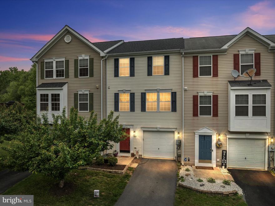 Welcome to this expansive three-story townhouse, offering over 2,100 square feet of finished living space, including bump-outs on all three levels. The main level invites you into a versatile rec room, perfect for a home office, gym, or media space, with walk-out access to the rear yard – ideal for outdoor gatherings. Plus, a rough-in for a future bathroom is already in place, providing potential for even more living space.
On the second floor, you’ll find a bright, open-concept kitchen with ample counter space, a dining area for entertaining, a cozy living room for relaxing, and a convenient half bath.
The upper level boasts a generous primary suite, complete with a walk-in closet, double vanities, a separate shower, and a soaking tub for a spa-like retreat. Two additional bedrooms and a full bathroom complete this level, offering comfort and privacy for family or guests.
Additional highlights include a newer roof for peace of mind, neighborhood playground access, and a serene backdrop as it backs up to a creek with nearby community access steps from your rear door. Just minutes from Winchester, this home provides both convenience and tranquility.
Don’t miss your chance to make this your home sweet home – schedule your tour today!