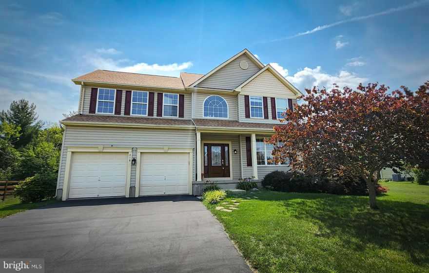 Located in an enclave of upscale homes near Mount Saint Mary's University and the FEMA National Emergency Training Center, this large home with open floor plan is sure to please. Beautiful gourmet kitchen with crisp white carerra quartz counters, stainless appliances, gas cooktop, and oversized island with second sink.  The kitchen has both eat-in dining space (with pantry), and clear sightlines to the cozy family room with floor-to-ceiling stone fireplace. The first level also includes a large formal dining room with plenty of space for traditional dining furniture, and a private bedroom/library/office flex room to the rear of the home.  As you ascend the staircase past the two-story foyer you'll find an expanded option plan upstairs, including a large primary bedroom suite with dual closets and sinks, and jetted soaking tub. The largest secondary bedroom has clever built-ins and the perfect window seat with custom cushions. The hall bathroom has dual sinks and a skylight, and all upper level bedrooms have ceiling fans. The laundry room is conveniently located on that same upper level.  With a full basement with high ceilings and side walkout, there is plenty of room for storage or future living space expansion. Out back, you'll find a rear patio and large gazebo, giving plenty of options for entertaining and relaxing at home.  The neighborhood is also adjacent to E. Eugene Myers Community Park for excellent walkable recreation opportunities.  High ceilings, fresh paint, hardwood floors, and new carpet in all bedrooms -- this home is available immediately.