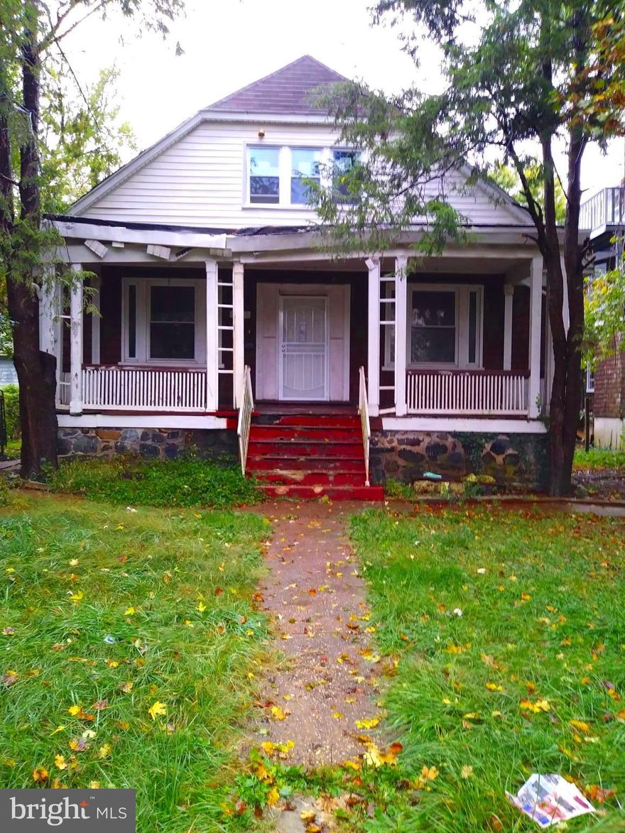 Investor special! Large home with big kitchen; 2nd floor has build-out for 3 bedrooms and roughed-in bathroom; basement has potential to be finished. Partial new roof & windows already completed.