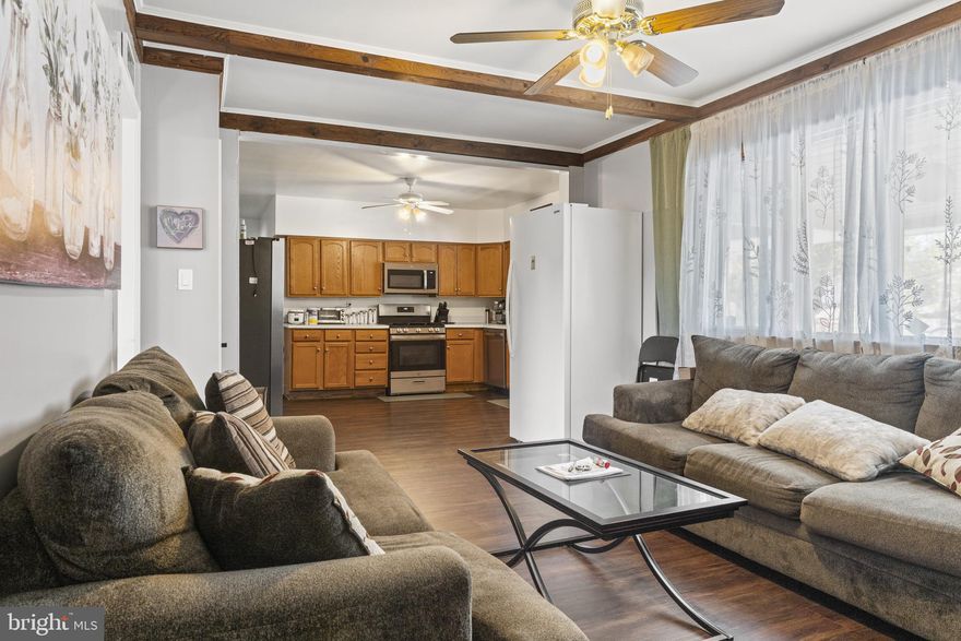 Sellers will offer $5,000 closing cost assistance to any buyer with a ratified offer by May 31, 2025.  The transaction must close for the buyer to receive the closing cost assistance. Come and discover this beautiful 5-bedroom, 2-bathroom home in Randallstown, MD, priced at $449,990. Your new residence features a traditional floor plan and a spacious kitchen equipped with stainless steel appliances. The main level offers a cozy family room with a decorative wood-burning stove, while the basement features lots of space for entertaining. Recent upgrades include new gutters, siding, and soffits, luxury vinyl plank flooring, and a new roof. Situated in a desirable neighborhood with easy access to major highways, shopping, and entertainment.  Your private yard and expansive deck allow you to entertain family and friends, as well as enjoy your morning coffee and planning time in your own private oasis.