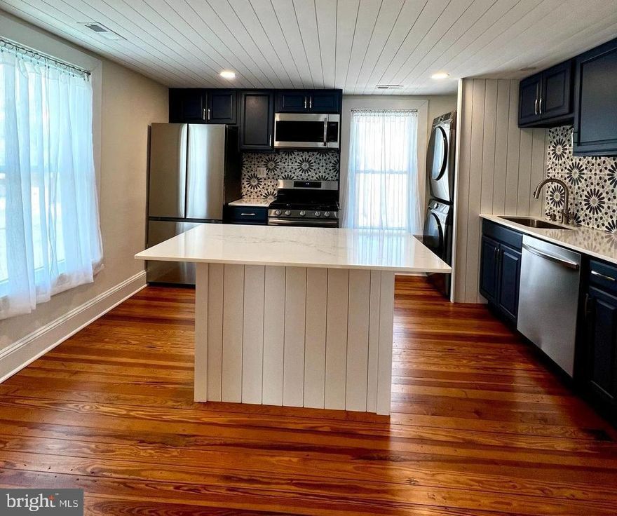 Reduced! $200 off 1st Months rent if you sign lease in February! Modern meets old in this charming smoke-free cottage in the heart of sought-after Historic Berryville - just 60 miles west of Washington DC in beautiful Clarke County. Cordial Coffee across the street.  Barns of Rose Hill, a variety of restaurants and shops a stone's throw away. This meticulously maintained 1902 American Foursquare home offers a 1200+- sf 2nd FLOOR APARTMENT with a private front-of-the house entrance.  Completely renovated in 2022 boasting refinished beautiful original hardwood floors throughout, quartz countertops, stainless appliances (gas stove, dishwasher, refrigerator, microwave) new cabinets, all-new bathroom with tiled shower/tub.  This unit offers one bedroom and a bonus room - can be used for storage/office; one full bath; eat-in kitchen and living room.  Lots of natural light,  vinyl windows and new full size washer/dryer included.  NEW HVAC system installed 1/14/25. On street parking and "as needed" off street parking available for 1 vehicle. INCLUDED in monthly rent: water/sewer/trash/lawn care/snow removal/filters. Tenant responsible for electric, propane and internet.

Excellent credit and references are required.  NO smokers.  NO smoking of any kind or vaping in or on the property. No pets. Renters insurance is required.  Owner is a licensed Realtor and lives in lower level unit.