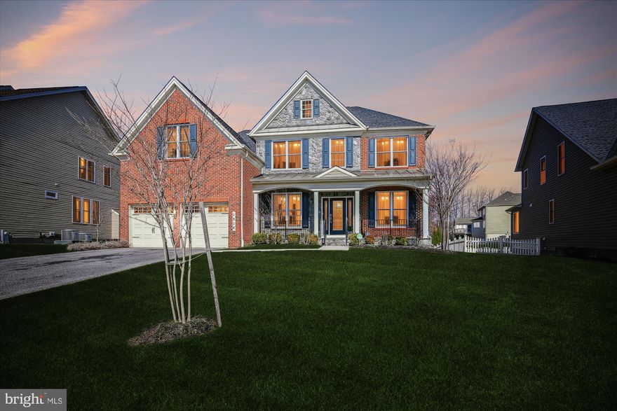 Rarely do homes such as this come up in Arundel Forest! You will be absolutely charmed as you enter through the custom glass entry door. Handsome hardwood floors. 2 rooms on the main level can serve as office, den, or playrooms. Please note there is a bump out  so more room at the back of the home. The great room is magnificent with 2 story ceilings.  Gas fireplace for cozy evenings. Open kitchen complete with stunning granite and 42" cabinets.  Beveled backsplash tiles adds to the kitchen's appeal. Tiled 1/2 bath on this level. Very large "drop zone" of off the  garage allows for coats and shoes to be placed. There is a pleasant view to the back yard. facing the woods. Lets go upstairs. Upstairs hallway overlooks the mail level. The primary bedroom suite on the second floor is beyond  spacious. Complete with separate shower, soaking tub, and duel closets. Laundry on this level as well. There are 3 additional  good size bedrooms and full bath. Ready for the amazing basement?  Finished basement  to include custom cabinetry with granite counter top. Walk up stairs to private back yard. Wait, there is more. A media room  completes this spacious basement. Arundel Forest has a club house ,pool, and walking trails. Close to all major routes and retail. Welcome Welcome!!