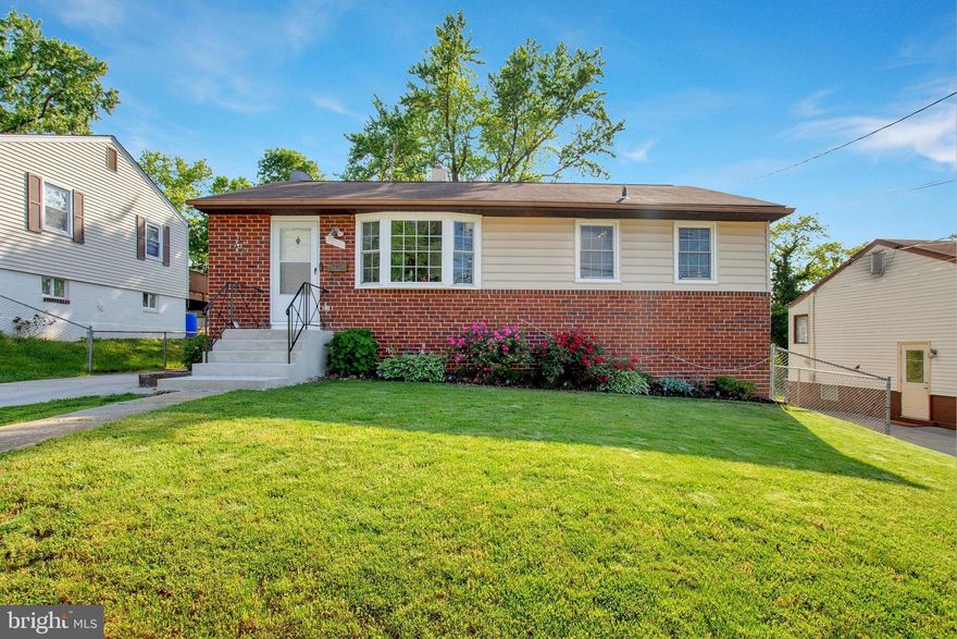 Set up your showing and make an offer today on this terrific detached home with a huge yard, located on quiet street Lanham Woods. The large picture window in the living room lets in abundant afternoon sunlight! The main level features hardwood floors in the living room and 2 bedrooms; the expansive kitchen and dining room features beautiful ceramic floors and a separate entrance from the driveway. The lower level features a huge family room with beautiful cedar ceilings, ceramic floors throughout, separate office, full kitchen, laundry room and master bedroom and bath. The location is easy access to Baltimore Washington Parkway, Route 50, and the Beltway and Route 450. Great for commuters and easy access to public transportation. Close to shopping and dining.