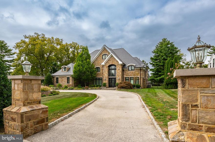 The pictures don't do it justice, MUST SEE IN PERSON..   A breathtaking 4 story  Main line luxury home that was part of the original A. Atwater Kent Estate, sits on a one acre lot and features 6 bedrooms, new roof,  7 full baths and 3 half baths. As you enter the home , you are greeted by a 20' tall grand entrance foyer with a magnificent curved mahogany staircase. Completely remodeled gourmet kitchen, with state of the art new appliances countertops and cabinets, must see in person to truly appreciate. A completely renovated first floor formal living room, family room, dining room, office and more. First floor includes all new windows and doors leading to the beautiful new outdoor patio with outdoor basketball court and grilling area. One of two first floor powder rooms & mudroom area provides access to the 3 car heated garage. The second  floor features the newly renovated master suite w/sitting room, closets that are like your own personal mall, large master bath including jacuzzi tub, spacious glass tile shower, granite counters & cherry wood - mode custom cabinetry. There are 3 additional bedrooms on the second floor each with their own private bath plus & au pair suite w/private bath & sitting room. A laundry room completes the second level. On the third floor is the in-law suite w/kitchenette, bedroom w/large walk-in closet& sitting area as well as large bathroom w/jacuzzi tub & glass shower plus loads of storage. Additional living space can be found on the lower level  done in red, white & black with kitchenette , large family room, 2nd laundry room, full bath and plenty of storage.