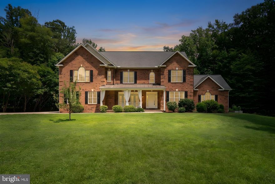 Tucked away on 3 private acres with no HOA, this classic brick colonial with a 3-car side-load garage feels like the kind of home people stay in for decades—not because they have to, but because they want to.

From the moment you pull into the extended driveway, there’s a sense of calm. Mature trees frame the property, the setting is peaceful, and the space around you feels intentional—room to breathe, room to grow, room to live the way you want.

Inside, the home opens up beautifully with over 4,600 finished square feet across three levels, designed for both connection and comfort. Natural light pours through large windows, highlighting the custom built-ins and expansive living spaces. The layout flows easily from the kitchen into the living and dining areas, making everyday life feel effortless—whether it’s a quiet morning coffee or a house full of people you love.

Winters here are especially cozy thanks to updated high-efficiency two-zone heat pumps and a new Blaze King wood-burning fireplace, offering warmth, energy efficiency, and that unmistakable feeling of home on a cold evening.

Upstairs, every bedroom feels like its own retreat, each with walk-in closets and private bathrooms—a rare luxury that makes daily routines smoother and personal space truly personal. The primary suite is especially inviting, offering a peaceful place to unwind at the end of the day.

The finished lower level adds even more flexibility—perfect for a home office, gym, media room, guest suite, or all of the above. This is a home that adapts to your life, not the other way around.

Outside, the land tells its own story. Backing to trees and surrounded by nature, the property offers privacy, open space, and freedom. Chicken coops and a goat pen can convey if desired, making this an ideal setup for anyone dreaming of a small homestead, gardening, or simply a more grounded lifestyle.

With no HOA restrictions, a 3-acre lot and a thoughtful blend of classic design and modern updates, this home offers something increasingly rare: privacy, flexibility, and the feeling that you’ve truly found your place.

This isn’t just a house—it’s a lifestyle, and it’s ready for its next chapter.