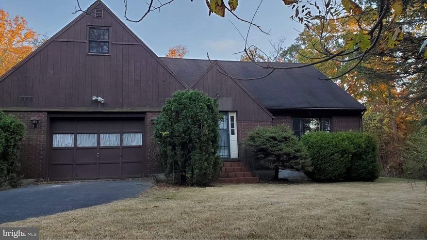 Huge, spacious home, with brick front  on a 3.34 acre, wooded lot.  Walk through the front door into the foyer to view the 19 x 13 living room with a bay window, separate dining room for large gatherings, a full bathroom, the kitchen, breakfast room and family room with woodstove  are part of the open floor plan.  The screened in porch off the family room lets in lots of natural lighting.  Upstairs are 3 spacious bedrooms and a full bath room.   Plus, a large hallway closet for more storage.  The bedroom to the left offers a large room off of the bedroom that could be an office, nursery or a walk in closet. One car attached garage. This house could use some updating.  It's priced right for a quick sale. There are three restrictions: 1. The lot may not be further subdivided,  2. No mobile home or trailer shall be parked, placed or otherwise situated upon the lot.   3. Only one single family dwelling house and appurtenant outbuildings may be built or erected upon the property. American Home Shield Essential warranty will be provided at closing.