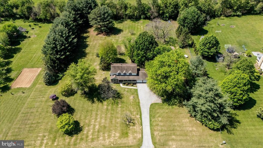 If you’re searching for a solid, well-maintained home with privacy and space, this is the one. Nestled on 3.01 acres, this property offers a peaceful, somewhat secluded setting while still providing quick access to Rt. 340 for easy commuting.  Enjoy relaxing on the expansive front porch, perfect for gatherings or relaxing evenings. Inside, you’ll find generously sized rooms throughout, offering comfort and flexibility for any lifestyle. The home features brand-new carpet, fresh paint, updated lighting, and new smoke detectors, giving it a clean, move-in-ready feel. The oversized garage includes a convenient half bath, and the lower level has been fully remodeled, offering fresh, updated space ready for your needs. Outdoors, the large backyard provides plenty of room to spread out, complete with a substantial garage/workshop/machine shed—ideal for hobbies, storage, or projects. Located near the River & Trail Outfitters Whitewater Tubing Loft, you’ll also have easy access to outdoor recreation.  This property combines space, updates, and location—come see why you’ll love calling it home.