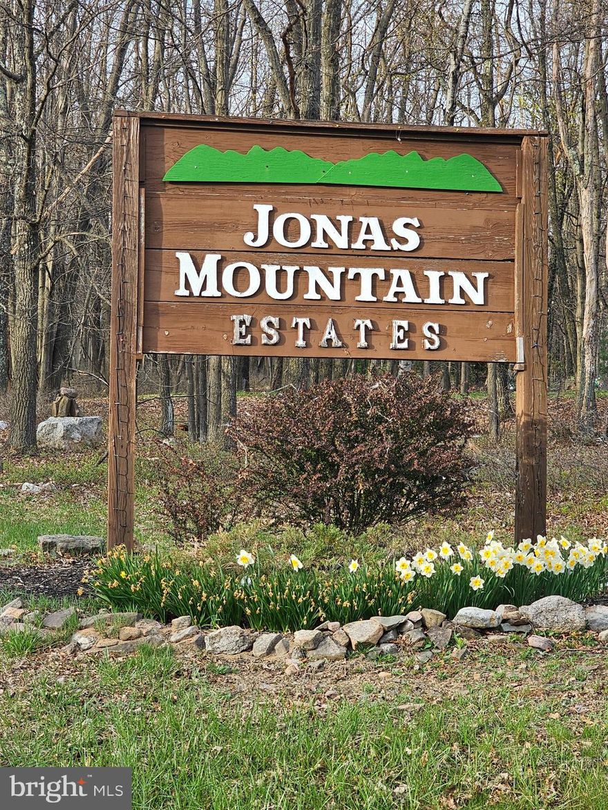 Build your dream home on this quite1.09 Acre lot available in Jonas Mountain Estates. Located on a cul-de-sac in a private non gated community, surrounded by wooded views and tranquility. Was perk approved