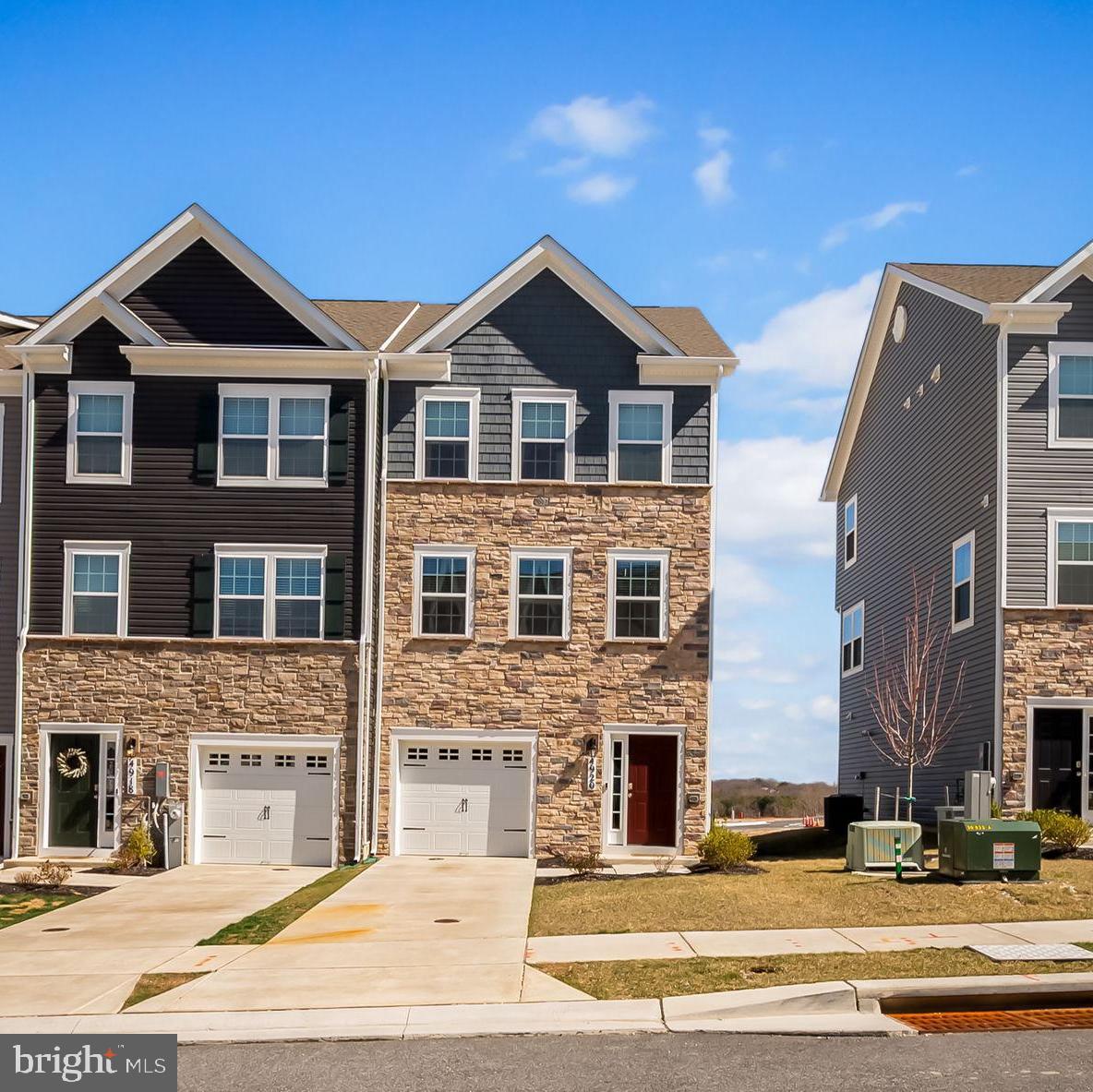 Better Than New in The Villages of White Marsh! Welcome to 4920 Arcola Road, a pristine end-unit townhome built in 2024 and ideally positioned in one of the most desirable locations in the community. Tucked away from busier main roads yet just steps from the neighborhood pool and the upcoming tot lot, this home offers the perfect blend of privacy and convenience.
Inside, you’ll find modern finishes, sun-filled living spaces, and the kind of low-maintenance lifestyle that only new construction can provide—without the wait. The open-concept layout is ideal for everyday living and entertaining, and the end-unit placement adds extra windows and enhanced natural light throughout. Connection for your EV charger is already in place in the garage.
Whether you’re commuting, shopping, or heading out for fun, this home places you close to it all—while keeping you nestled in a quiet corner of The Villages of White Marsh. This is more than move-in ready—it’s truly better than new including updated paint throughout as well as washer and dryer and reduced transfer and recordation taxes. Call today to learn more or schedule your private showing!