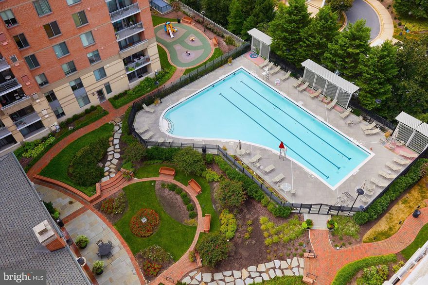 PRICE ADJUSTMENT! Location! Location! Location! Welcome to the Gallery at White Flint, a luxurious building that sets the stage for a refined lifestyle. The prime location of this condo offers unbeatable convenience, placing you within a short distance from the Metro and the vibrant Pike and Rose district. Explore a myriad of shopping, dining, and entertainment options right at your doorstep. This inviting two-bedroom, one full bath condo is a testament to modern living at its finest. Step inside to discover an updated interior that boasts stunning views overlooking the serene pool and courtyard. You will love the refinished hardwood floors throughout combining elegance with easy maintenance. Additional updates include new HVAC, new kitchen appliances, new kitchen hardware, freshly painted walls, as well as, skimmed and freshly painted ceilings. With a private balcony, you can enjoy moments of relaxation while soaking in the tranquil surroundings.  Enjoy a range of amenities that elevate your everyday life. From a refreshing outdoor pool to a fully-equipped fitness center and inviting community room, you'll find opportunities to unwind and connect within the building. For your daily needs, the Gallery Market and Café located within the premises offers a convenient array of food, beverages, and essential services such as dry-cleaning. With its luxurious ambiance, exceptional location, and top-tier amenities, this condo presents a unique opportunity for you to embrace a lifestyle of comfort, convenience, and sophistication.