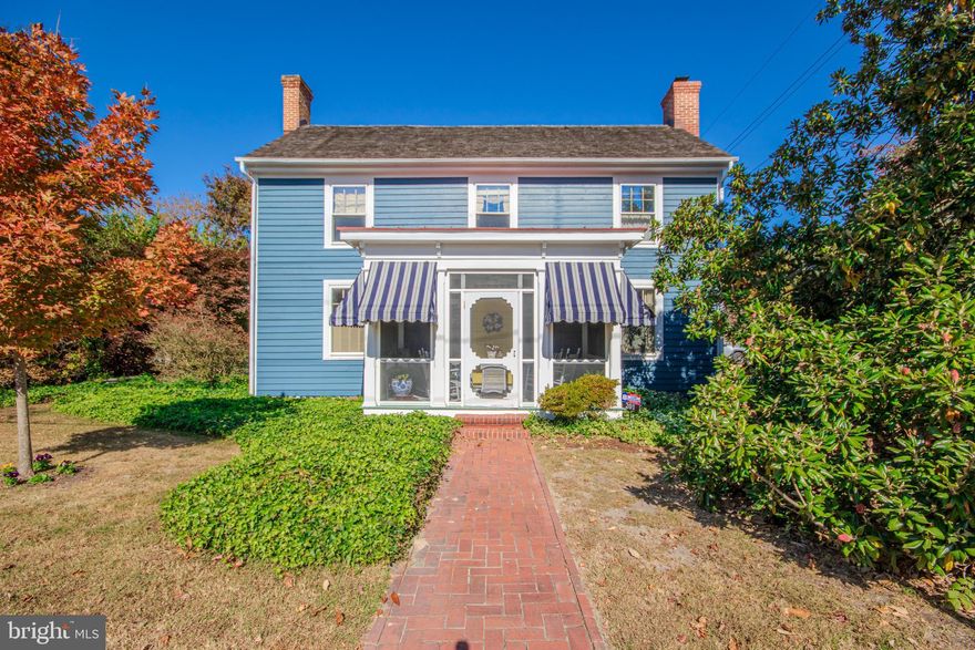 This meticulously maintained, charming, gracious, comfortable, efficient, historical yet updated home has been in the same family since 1903!! The old world details are unmatched in modern construction and the updates have been carefully designed to preserve the historical integrity of the property. The unique, antique hardware throughout and Mackensie-Childs Pottery sink and sconce in the upstairs bathroom are just a few of the details that add to the beauty of the property. There are lighted, cedar lined closets in the bedrooms and flooring with radiant heat in the full bath on the first floor. Just outside the kitchen and dining area there's an inviting  patio with a fish pond water feature, complete with lily pads, and a private nook with a hottub. A very productive garden and heirloom plants compliment the outdoor space.  Across the lawn, there is a detached garage/carriage house with a kitchen, full bath and finished second floor room, complete with a working fireplace, that could fulfill any number of uses from office to craft or game room, to guest space. It has forced air gas heat and central air and a rinnai water heater. The possibilities are endless. This property must be seen to appreciate all it has to offer.