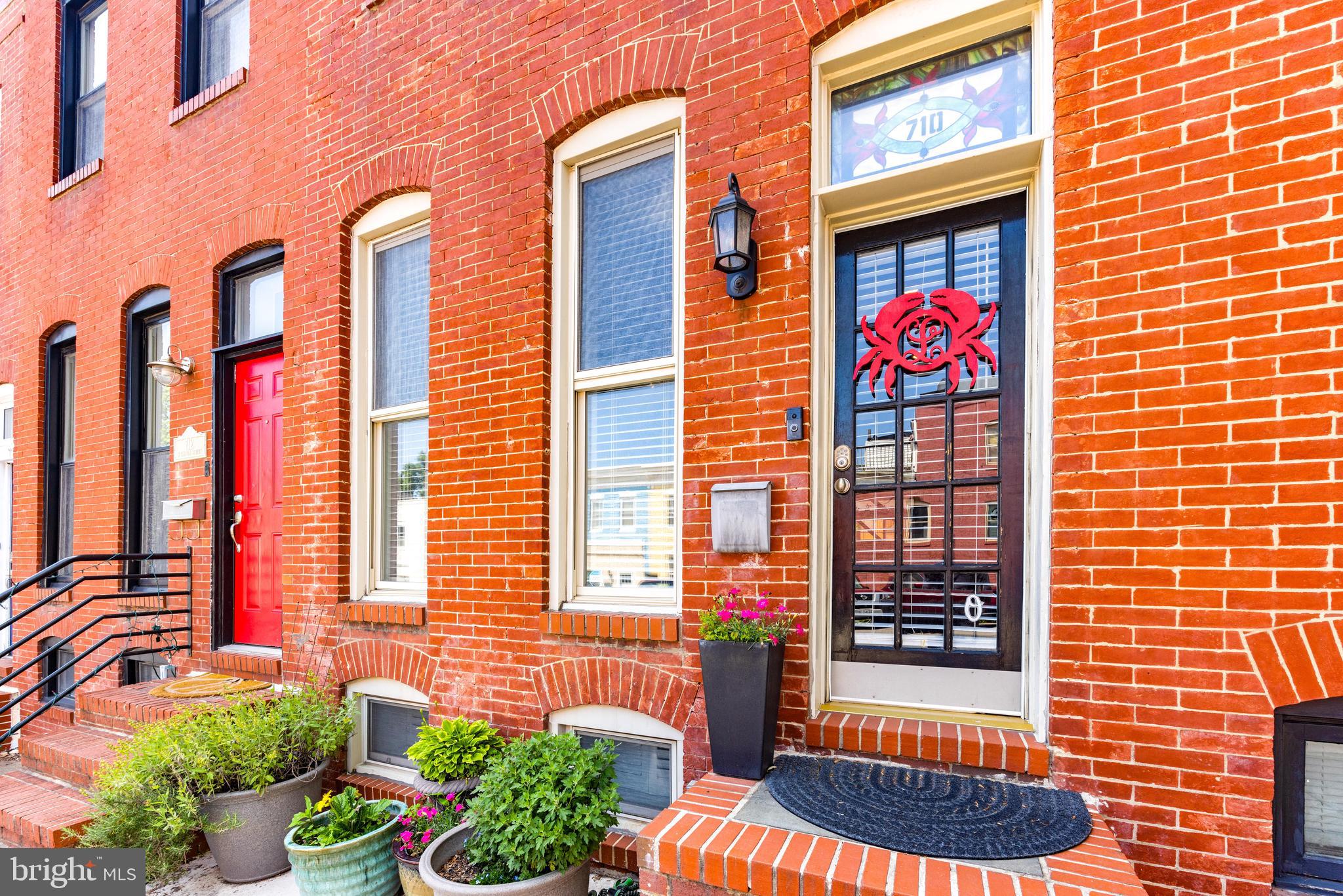Welcome to this beautifully and meticulously maintained brickfront rowhome in iconic Canton. This 2 bed, 2 bath home is full of classic city charm. From the exposed brick accents to the rooftop deck with panoramic city views, you will be engulfed in all things Baltimore. Beautiful hardwood flooring leads you through the living room with fireplace and separate dining area to the spacious kitchen with plenty of counter space that will surely inspire your inner chef. French doors lead you to the covered deck and parking pad. Upstairs you will find two spacious bedrooms, 1 full bath with jetted tub and access to both laundry and upper deck off of the one bedroom. Downstairs hardwood laminate flooring in another large living space that could double as a 3rd bedroom.
Don't miss out on the opportunity to make this stunning property yours.