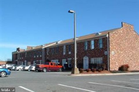 Photo of 7700 Old Branch Avnue Ave #E 208, CLINTON, MD 20735 (MLS # MDPG2206906)