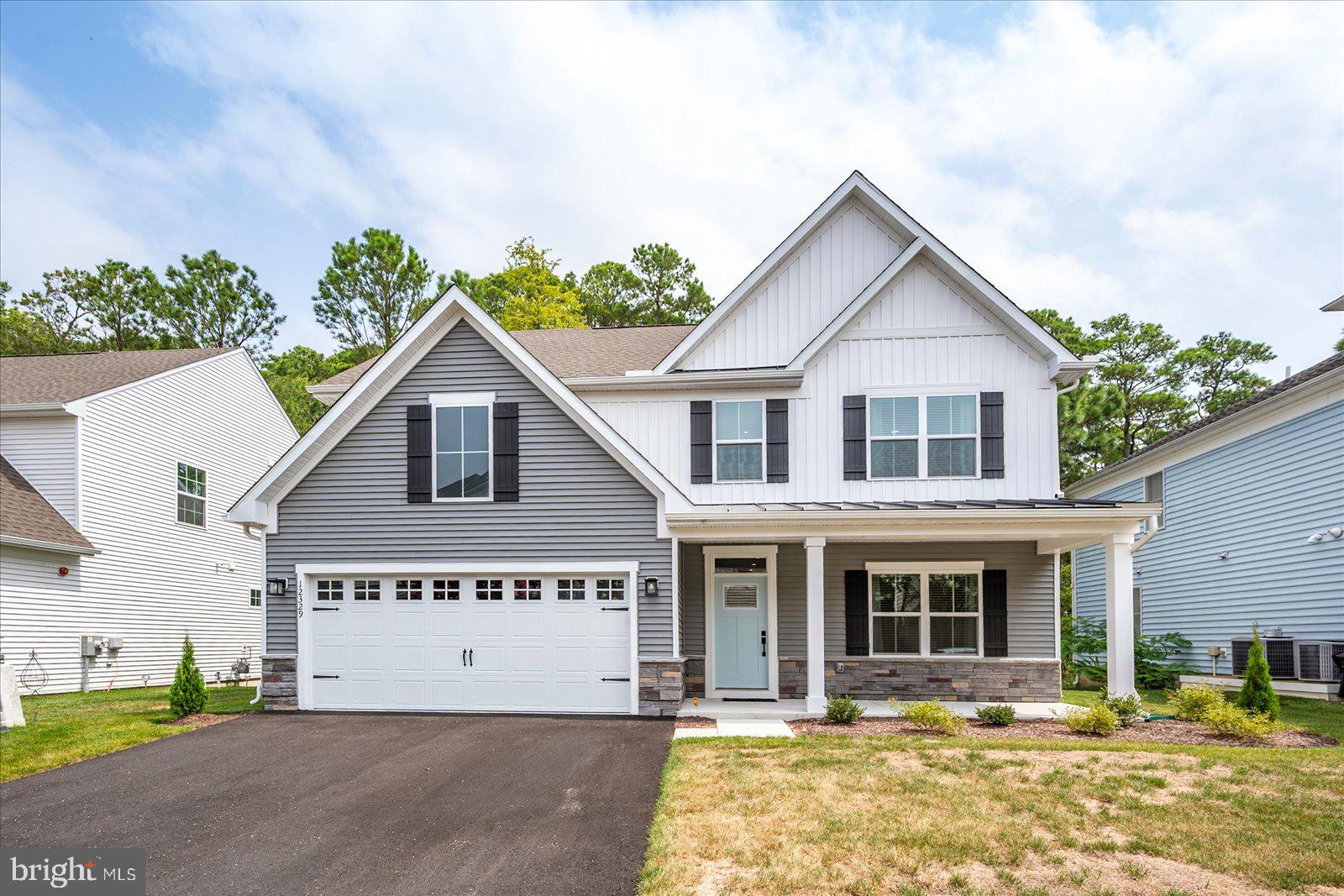 Exquisite newly constructed home, completed in 2024, offering 3 bedrooms, 2.5 baths, and 2,527 sq. ft. of impeccably designed living space. Located in the Landings in Bayside located off Rt. 611 and only 3 miles from Rt. 50 provides easy access to all that West Ocean City has to offer! This furnished residence showcases exceptional craftsmanship, high-end finishes, and thoughtful details throughout, creating a truly move-in-ready retreat.The first floor features an expansive open-concept layout with a sophisticated living room centered around a gas fireplace, a spacious dining area, and a chef’s kitchen designed to impress. The kitchen boasts quartz countertops, an oversized island with seating, premium stainless steel appliances, a gas range, 2nd oven with microwave, soft-close cabinetry, and a walk-in pantry. The luxurious primary suite on the main level offers a spa-inspired en-suite bath with dual vanities and a generous walk-in closet. Additional highlights on the first floor include a private office that may serve as a fourth bedroom, a powder room, a separate laundry room, and elegant luxury vinyl plank flooring throughout. Upstairs, you’ll find a versatile loft living area, two spacious bedrooms each with ceiling fans and walk-in closets, a full hall bath with a quartz double vanity, and a large storage room for added convenience.This home is further enhanced by modern amenities such as recessed lighting, a fire sprinkler system, a tankless gas water heater, and a 2-car garage. Combining timeless style with modern comfort, this property is the perfect blend of sophistication and functionality—an exceptional opportunity for discerning buyers seeking a truly turnkey home! Bayside Community amenities include outdoor pool, indoor pool (open year round), club house, fitness center, tot lot, basketball & tennis court, bayside pier & Kayak launching. Per management company the HOA fees include trash pickup, lawn/shrub maintenance. The community's West Ocean City location is convenient to many restaurants, shopping, Marina, golf courses, amusements, Ocean City Beach & Boardwalk (5 miles away) & Assateague Island State Park (5 miles away). Come make this beach home all yours!