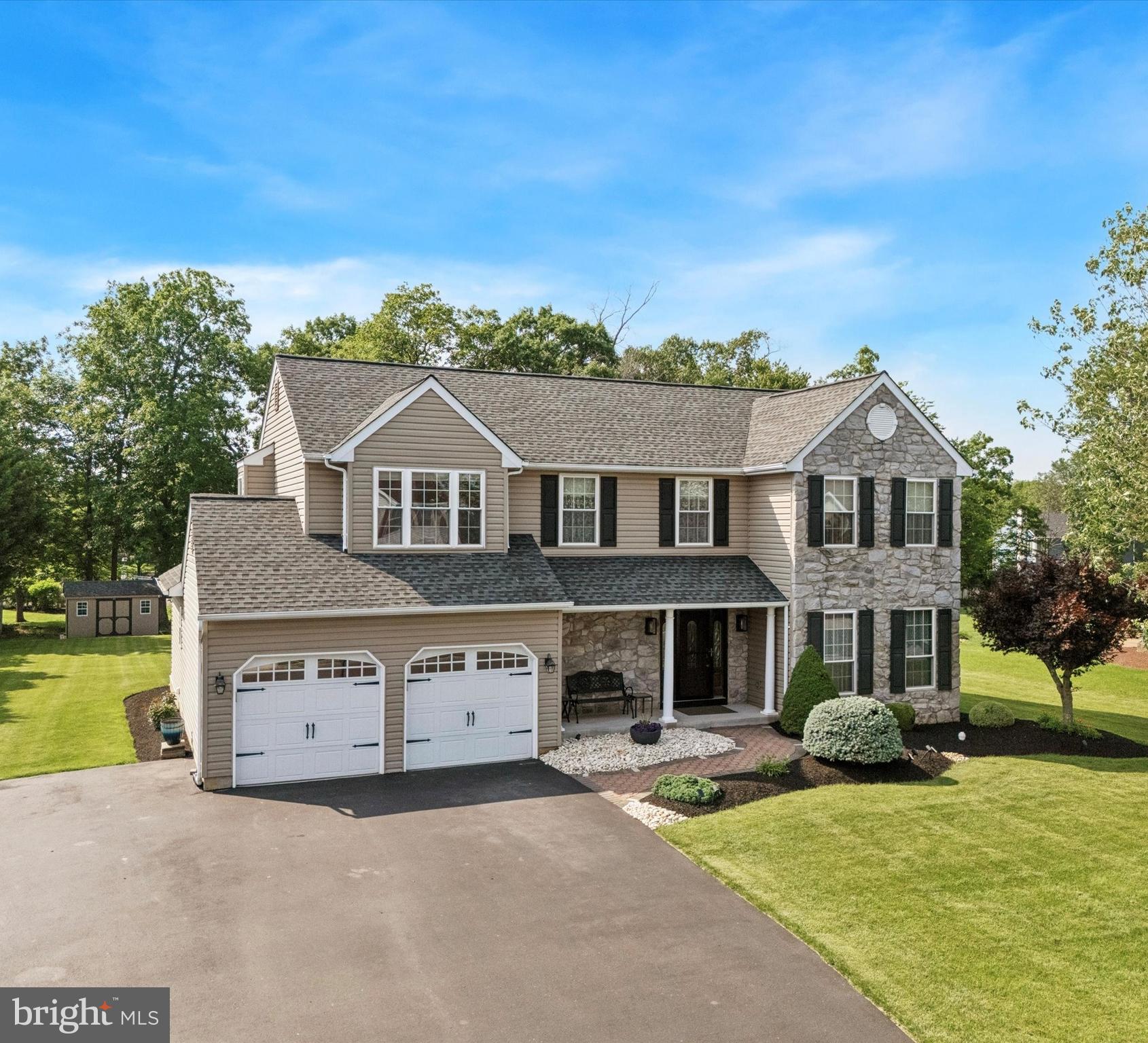 Stunning Farmhouse Style 4 Bedroom 2 & 1/2 Bath Colonial in the Beautiful Central Bucks Hidden Pond Neighborhood!! Situated on a flat pristine 20,000 plus Square Foot Warwick Township property!! The serene back yard features an Amazing 20 x 30' Custom Composite Deck with accenting Railings & LED Lighting!! Enjoy BBQs with Family, Friends & Neighbors overlooking the Peaceful Back Yard Oasis!!
With the wide and deep property, you can Envision a potential future inground pool if desired! 2 Car Garage with Beautiful Windowed Garage Doors!! Large Expanded driveway with room for 8 cars (6 driveway & 2 garage)!
Upon Entering this Dalton Farmhouse Model Home, you are greeted by a spacious and Beautiful 17-foot-high Foyer & beautiful Floor Tile that leads & transitions into the Stunning Kitchen!!
The Gorgeous Eat-In kitchen has Beautiful Ceiling Height Cherry Kraft Maid full extension, soft close Cabinetry (no soffits, so lots of storage)!!
Enjoy the Stunning Granite Kitchen Counters. The Oversized Island with Granite Top has room for seating and anchors the center of the kitchen! The Kitchen also boasts of a Breakfast Nook with space for a family sized table and chairs surrounded by natural window lighting!
The kitchen overlooks the family gathering area where the cook is surrounded by a full suite of the GE Profile High End appliance package (Including Oven, Microwave, Dishwasher and Oversized built in French Door Refrigerator)! The Kitchen also features a nook that can be utilized as a coffee station or a drop zone for phones & keys! The Beautiful Family Room features an Amazing Floor to Ceiling Stonework Gas Fireplace featuring a pushbutton direct vent! The Family Room also boasts of a 12-foot Cathedral Ceiling and Skylights!
The beautiful Family Room Sliders open to the Gorgeous Expansive Composite Custom Deck featuring over 600 sq feet of outdoor living space with views of the Large Lush & Open Back Yard!! This home has an Open Design flow with Tasteful Neutral Colors & Decor throughout! Along with the Tile flooring in the Open Foyer & the Kitchen there are Bruce Hardwood Floors in the Dining Room along with Trim Work & Chair Rails!
The Dining room complete with Crown Moldings opens to the Comfortable and Spacious Living Room.
The 1st floor Half Bathroom includes the same Beautiful Granite Counters and cabinets that the kitchen has! The 2nd floor hall bath includes upgraded cabinets, granite and tile throughout.
The Spacious 4 bedrooms on the 2nd floor feature a Large Primary Bedroom with an Attached Bathroom with tile throughout! The Main Bedroom also features a Tray 9-foot Ceiling! The 3 remaining bedrooms feature Newer Carpeting, Ceiling Fans, and Newly Painted walls allowing for a true Move in Ready space!
The basement is finished to include over 700 square feet of living area! Enjoy the finished play area, TV area and room for exercise/gym space. Also enjoy the basement area work from home office or music room & separate utility room! The Home has a Tankless Hot Water Heater for unlimited Hot Water & 200 Amp Service! The property outside also features LED lighting, a large, expanded driveway, a 10 x 14 Foot Shed (installed in 2022) to store yard toys & equipment! The 2-car garage is complete with beautiful garage doors & garage door openers. Close by is the beautiful Hidden Pond Park with Playground, Basketball & Ball Fields! This Spectacular Home has very nice Curbside Appeal!! Gorgeous property inside & outside!! Don't wait with this one!!