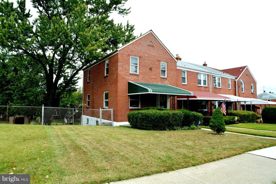 Charming All Brick End Unit Townhouse located minutes from 695 and all the shops on Rt. 40!! brand new flooring on main level and upstairs. Freshly Painted!! Full Bath with Jetted tub and separate showing in the basement. Enjoy the large yard around the house with a Walkout Level basement to the backyard. Nice neighborhood on a quiet street and close to Park!