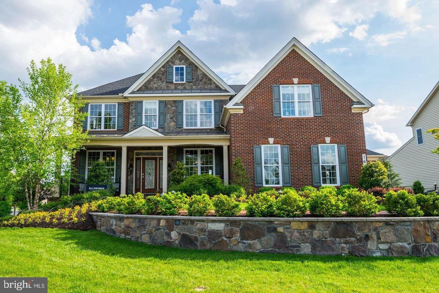 Welcome to the prestigious Arundel Forest community, where luxury meets elegance in the highly sought-after Toll Brother’s Ellsworth Manor former model home. This stunning home boasts exceptional craftsmanship and impeccable attention to detail, offering a truly elevated living experience.

Step into the grand foyer, adorned with a sweeping staircase and soaring ceilings, setting the tone for the elegance that awaits. The open floor plan seamlessly connects the formal living and dining areas, providing the perfect space for entertaining guests and hosting memorable gatherings.

The gourmet kitchen is a chef's dream, featuring top-of-the-line appliances, custom cabinetry, and a spacious center island. The adjacent breakfast area overlooks the picturesque backyard, allowing for a serene start to your day. The family room, complete with a cozy fireplace, offers a comfortable space to relax and unwind.

The luxurious primary suite is a private haven, featuring a sitting area, two walk-in closets, and a spa-like ensuite bathroom adorned with dual vanities, a soaking tub, and an oversized shower. Four additional generously sized bedrooms and a second bathroom provide ample space for family and guests.

The lower level of this home is designed for entertainment, boasting a fully finished basement with a custom wet bar, a cozy area to watch movies, and a recreation area. This space is perfect for hosting game nights or movie marathons with loved ones.

Enjoy the outdoors in the professionally landscaped backyard, with top of the line stainless steel gas powered appliances perfect to entertain guests with a BBQ. There is a low maintenance TRX deck and a two tier spacious patio with flagstone pavers and lush greenery, providing a tranquil setting for outdoor dining and relaxation. The three-car garage offers ample storage and parking space.

Residents of this community have access to a range of amenities, including a clubhouse, pool, fitness center, and tennis courts, ensuring an active and vibrant lifestyle. Conveniently located near shopping centers, and major highways, this home offers both luxury and convenience.

Don't miss the opportunity to make this Toll Brothers Ellsworth Manor model your own. Schedule a private showing today and experience the epitome of luxury living in the prestigious Arundel Forest.