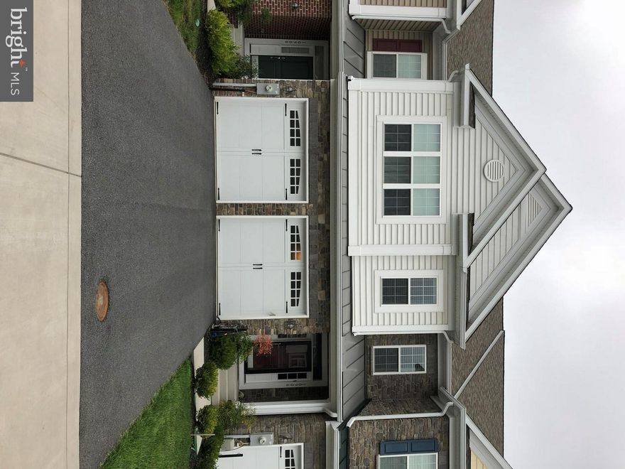 WOW. THREE YEAR NEW LUXURY TOWN HOME IN MUCH SOUGHT AFTER HOWARD COUNTY MD COMMUNITY OF THE VILLAGES AT TURF VALLEY.  This home is loaded with over 3400 sq/ft of living space. Three bedrooms three and one half baths. Too many options to list. Why wait for new build when you can have the home you desire today. HOA fee covers lawn care.