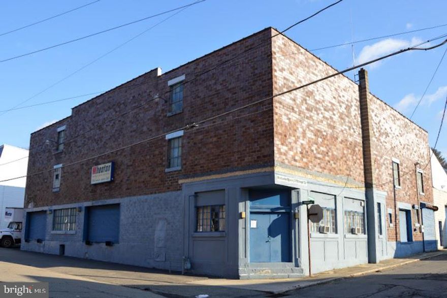 Approximately 27,600 square feet of warehouse/storage area with approximate 400 square foot office with private rest room.  Building is currently operated as a storage facility.  Three (3) levels in main building approximately 20,000 square feet in total  approximately  8'10" clear ceiling height.  A portion of the space in the main building (approximately 4,800 square feet) has 14'5" clear ceiling height.    Four dock height doors.   There is a freight elevator rated for 4,000 pounds servicing all three floors.  Auto access through drive in door directly to elevator.  There are two fourteen foot (14') drive in doors in high ceiling area of the main building.   There is an addition to main building of approximately 2,450 squarer feet with a rear separate entrance through a man door and two ten foot garage doors, approximately 11' clear ceiling height.   Possibilities of continuing storage use, along with many other possible uses with zoning approval.