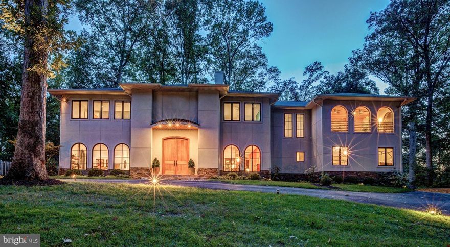 Sunlight streams throughout the airy interior of this Bespoke Modern Home w/elegant avant garde finishes. Expansive floorplan for formal entertaining & casual family living -  indoors & out. Acacia wood floors. 2-story stacked stone fireplace. Dramatic floating staircase. Impressive Chef's Kitchen. 5 BR, 6.5 Bas including Show-Stopping Master Suite. Geothermal HVAC. LL w/Kit. 3 Car Garage.