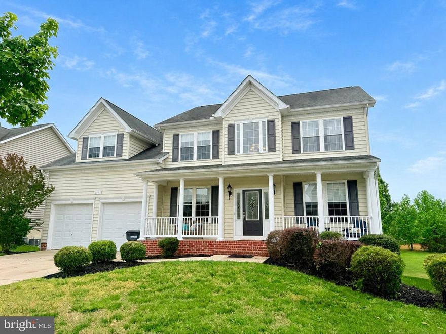 Located in the popular Broad Creek neighborhood, this spacious two-story home offers over 4,500 square feet of beautifully designed living space. Features include hardwood floors, a  two-story great room, separate formal dining room with crown molding, and a main-level office perfect for working from home. (main level heat pump replaced 2024)

The kitchen is equipped with ample cabinetry, a center island & granite countertops & new refrigerator & double ovens.  

Upstairs, you’ll find generously sized bedrooms,  owner’s suite has an arched ceiling, sitting room, dual vanities, and a large tiled walk-in shower with double shower heads. The upper level also includes a convenient laundry room and three additional bedrooms.

The walk-out basement is mostly finished and offers excellent flexible living space with a media room, craft area, recreation room, and a third full bath. A large storage room with a window and closet could easily be converted into a fifth bedroom if desired.

Enjoy relaxing on the welcoming front porch or entertaining on the new back deck overlooking the private backyard. This beautiful home offers space, comfort, and flexibility throughout and is ready for its new owners.