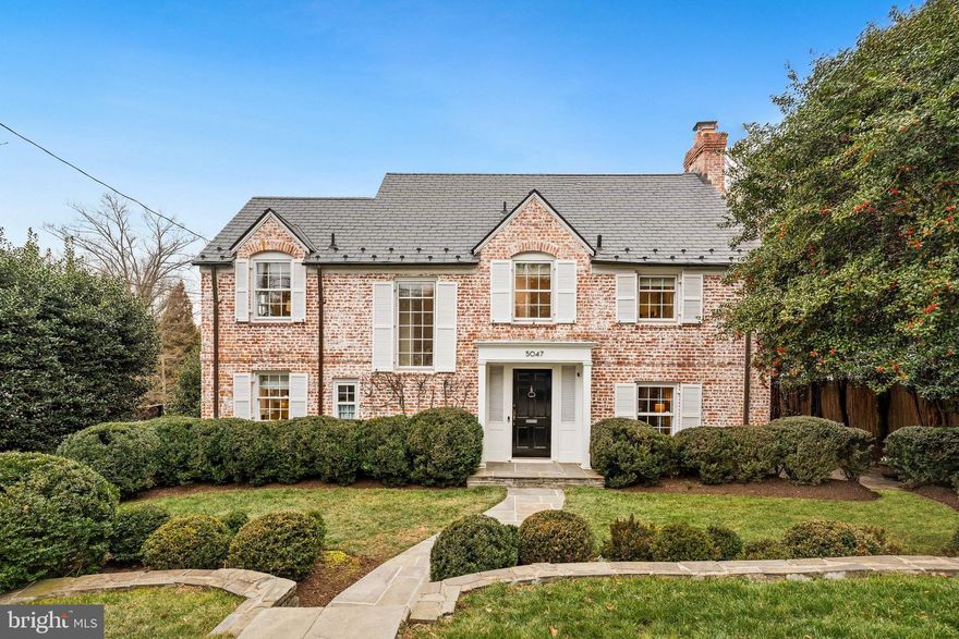 New to the Market!! 5047 Glenbrook Terrace, NW is quietly situated on a coveted cul-de-sac in the heart of Kent and offers a well-designed layout across four finished levels with a two-car attached garage. The main level features a light-filled foyer leading to a spacious living room with a wood-burning fireplace, built-in bookshelves and French doors opening to a secluded patio - perfect for Al fresco dining. Just off the living room is a well-appointed family room with a beautiful oversized arched window, built-in bookshelves, and French doors leading out to a large outdoor terrace that overlooks the backyard. A gracious dining room connects seamlessly to the kitchen, ideal for both everyday living and entertaining. Completing this level is a powder room and hallway closet. Upstairs to the second level is the tranquil primary bedroom that features an oversized window, two closets and an en-suite windowed bathroom with a walk-in shower. Also on this level are two additional bedrooms, a hallway windowed bathroom with a bathtub, and a linen closet. The third level offers a fourth bedroom that has additional storage closets. The lower level provides flexible living space with a recreation room and den, ample storage closets, a laundry area with side-by side washer and dryer, a separate water closet, a walk-in shower and direct access to the two-car attached garage. Set in one of Northwest DC's most desirable neighborhoods, Kent is inbounds for Mann, Hardy and MacArthur schools. It is just steps from several parks as well as the local shops and cafes of the Palisades, Spring Valley and Wesley Heights. The proximity to Maryland and Virginia offers wonderful accessibility to major commuter routes, the Capital Crescent Trail, and Sibley Hospital.