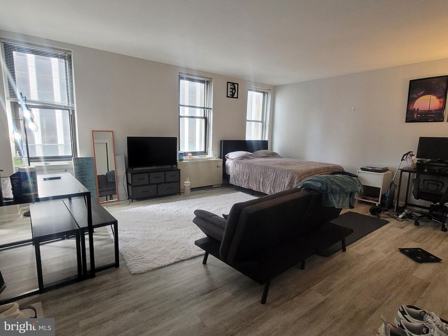 Sun-soaked studio with wood-like vinyl flooring at The Wellington on Rittenhouse Square! This home has a spacious living area and excellent closet space; updated bathroom with European style vanity and exquisite tilework; and separate kitchen with ample storage space. The Wellington is a pre-war apartment building located on Rittenhouse Square offering a 24 hour doorman, on-site management, and access to a nearby fitness center at 1845 Walnut.