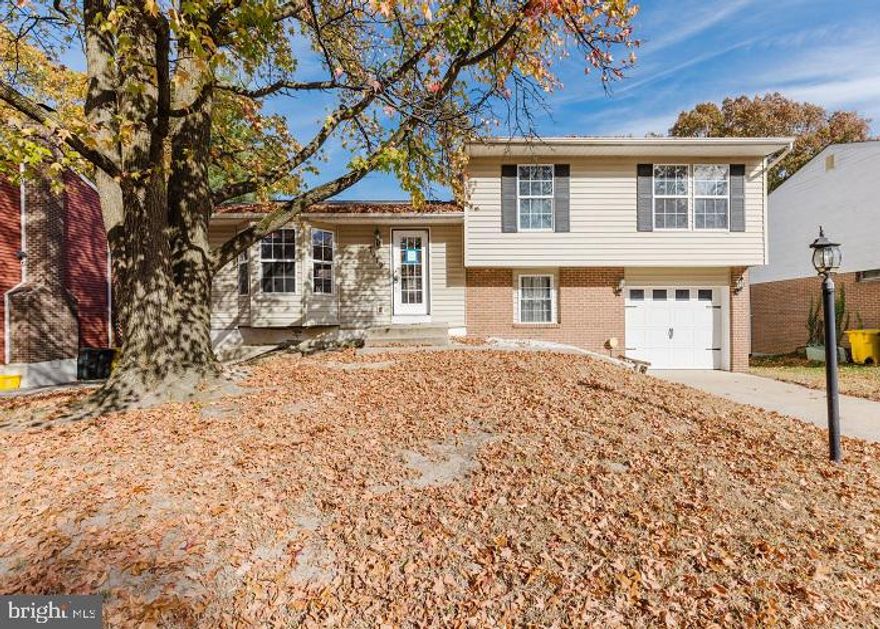 Built in 1971, this split level home offers approximately 1488 finished square feet, three bedrooms, two full baths, kitchen with island, enclosed rear porch, partially finished basement with half bath and dry bar, large rear deck and built-in one car garage. This home sits on an approximate 7150 sqft lot.