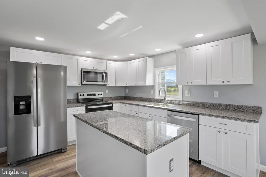There’s something special about this Yellow Spring home — a feeling that greets you the moment you pull into the drive. Built in 1908 and beautifully brought back to life, it blends history and modern comfort in all the right ways. New essentials like the roof, HVAC, water heater, and windows mean all that’s left to do is breathe, relax, and enjoy.
Inside, four bright bedrooms and welcoming living spaces flow with warmth and light — perfect for gathering, creating, and growing. Step outside to 1.22 acres of open country air, where the fenced garden space and gentle breeze make every day feel a little simpler, a little sweeter.
Set along Carpers Pike, this peaceful retreat offers small-town serenity with easy access to everything you need. It’s more than move-in ready — it’s ready to be loved.