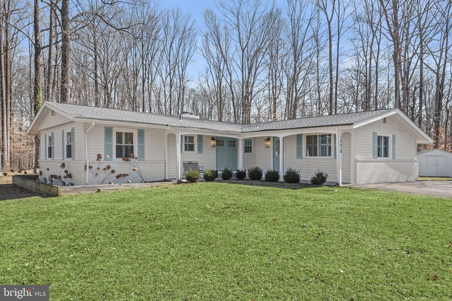 ***OFFER DEADLINE MONDAY MARCH 11TH AT 12 NOON****Welcome to this beautifully renovated Rancher sited on 2 sprawling acres with picturesque, wooded views, and offers an array of updates, from plantation shutters to accent molding, ensuring modern comfort and style. With over 3,000 sq. ft. of living space, the bright and airy open floor plan boasts rich hardwood flooring throughout. The gourmet kitchen is a chef’s delight, featuring an oversized peninsula island breakfast bar, quartz countertops, and stainless appliances, seamlessly adjoining a cozy sitting room with patio access. Three entry-level bedrooms and three full baths offer convenience and elegance with hardwood flooring and plantation shutters. The finished lower level expands the living space with a family room, two bonus rooms, and a spacious laundry and storage room. Outside, enjoy the tranquility of 2 landscaped acres with a patio, raised garden bed, enclosed vegetable garden, storage shed, and detached garage. Lease solar panels ensure energy efficiency and savings. This home epitomizes modern living amidst natural beauty and convenience.