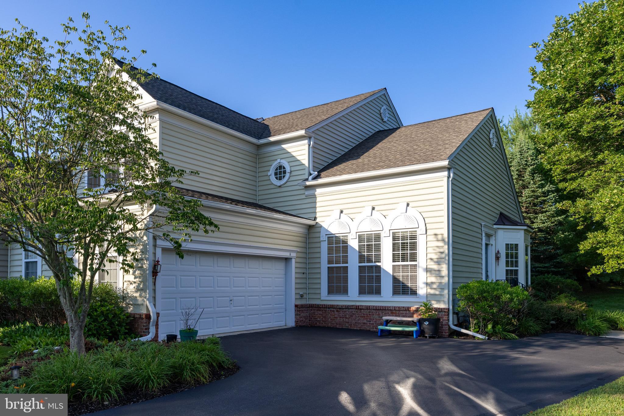 Desirable Hunters Run Community End Unit Townhouse with a Hard to Find First Floor Primary Bedroom and Full Bath. The main features of this home include Bruce hardwood flooring throught the entire main living area; a vaulted family room ceiling along with gas fireplace; second floor living area with a Jack & Jill full bath serving the 2nd and 3rd bedrooms, plus open loft area; finished basement with 3rd full bath and egress window; . The floor plan includes a living room area which is open to the formal dining room, kitchen with breakfast area and access to a newer composit deck, which overlooks a private setting. Being an end unit there are lots of windows and natural light. Also included is a 2 car side load garage.