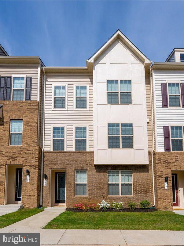 Almost new; luxury townhouse in Leesburg, right next to Costco; 9 foot ceilings throughout; luxury vinyl flooring on the main and 2nd level; bedroom level is carpet; home has 24 foot wide deck on the back facing tree line; main level has a gourmet kitchen with stainless steel appliances and quartz countertops; family room off of the kitchen has modern mid wall electric fireplace; primary bath suite has frameless glass shower doors and oversize shower; lawn is maintain by HOA!