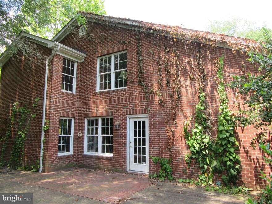 NEW PRICE...Due to no fault of the seller, the contract has fallen through!!!  Welcome to this charming all brick townhouse with only one other home attached.  Found on a quiet street, this home backs up to meadows which provide even more peace and tranquility.  In need of a little TLC, the potential for this property is only marred by a lack of imagination.  This 2 bedroom, 2 full bath home has lots of charm and character that, with a little help, could exude even more charm than it already possesses.  One of the best features is a loft that overlooks the living room area plus the vaulted ceiling opens everything up to lots of natural light.  There is a huge deck on the side of this home that would be perfect for entertaining, resting in a hammock or sipping a long cool drink after a hard days work.  There is also a front and rear gate on the deck and a little shed in the rear yard.  This is a rare find, so don't miss out!!!