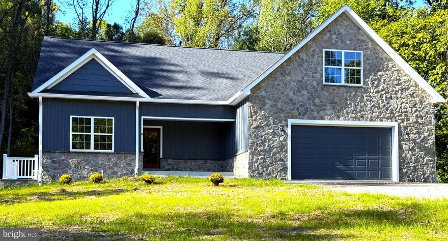 Seller assist included for closing costs or appliances. Brand new home with so many upgrades- quality throughout. Walk to  the back side of the ski slope (need season pass) or just stay home and enjoy nature. Solid antique oak flooring, oversized kitchen with granite countertops. This house is huge and must be seen to appreciate it. Basement could be finished into playroom, pool room, wine cellar, man cave, home theater etc. rough in for basement  bathroom, but the house already has 3.5 baths.... Will go just about any loan program 100% finished and ready to move in. Large walk in closet in primary bedroom, with private bath- home life was never so sweet.