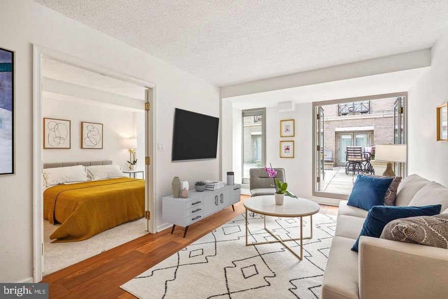 *Price improvement!* Rare and special opportunity to live in a lovely building and a prime location right down the street from the White House. This lux 1 bed/1bath renovated condo features hardwood floors, open kitchen with chic cabinets & appliances, and bathroom with beautiful tilework. Large floor to ceiling windows & doors flood the unit with light and provide walk-out access to a large courtyard for your quiet enjoyment and entertaining. Dual bedroom closets, and abundant storage space throughout. Recently replaced in-unit stacked washer and dryer, as well as younger HVAC unit & water heater. Amenities include: 24hr front desk, on-site management, rooftop with sweeping views of the city, gas grills, swimming pool, and recently renovated fitness center with new workout equipment (incl. Peloton). Market Square is a hot commodity: close to the many shops and restaurants of Penn Quarter, theaters, world-famous museums, Capital One Arena, the National Mall, and so much more. Commuting is a breeze from this location: Metro station on the corner, just minutes to National Airport and Union Station, and walkable (or a short Uber) to many major government agencies. Garage parking is available to rent for approx. $250-270/mo). Building does not allow rentals to have pets. Furnished: $2800/mo. Unfurnished, $2650/mo.