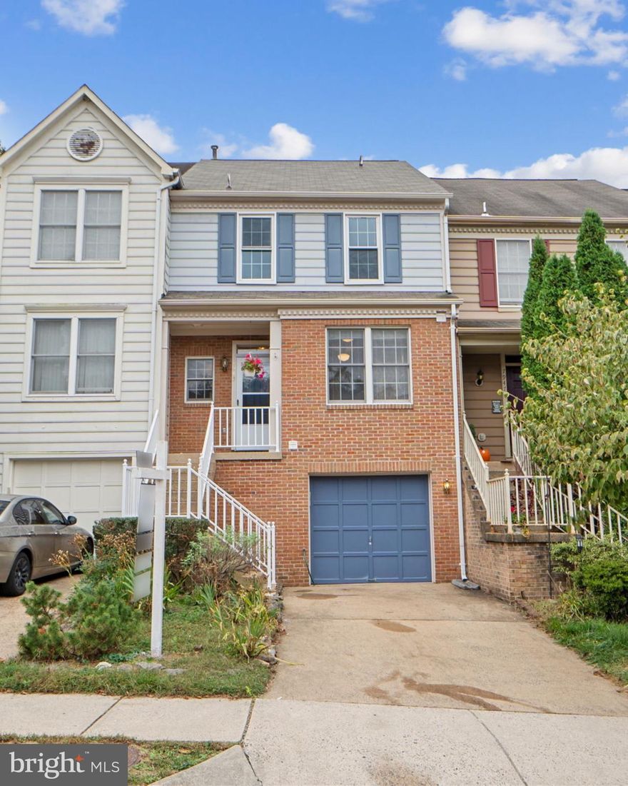 OPEN HOUSE SNDAY 11/2 FROM 1-3 PM  Welcome to 7945 Blue Gray Circle, a charming 3-level Colonial townhome with a garage, tucked inside the sought-after Paradise community of Manassas. Built in 1989 and meticulously maintained, this home offers 2 bedrooms, 2 full baths, and 2 half baths across 1,448 finished square feet.

Step inside to a traditional yet inviting layout. The main level features a spacious living and dining area filled with natural light, alongside a large kitchen with space for a breakfast table. Upstairs, two primary suites each enjoy their own private baths, while the finished lower level adds flexibility with an additional bedroom/bonus room, a half bath, and a cozy recreation room complete with a wood-burning fireplace—perfect for movie nights or gatherings. Additional highlights include hardwood floors, upgraded countertops, ample storage, and a fenced backyard with deck for private outdoor enjoyment.

The Paradise neighborhood is known for its convenience and community feel, with low monthly HOA dues. From here, you’ll enjoy quick access to I-66, Route 28, and Route 29, plus nearby VRE service for commuters. Shopping, dining, and everyday amenities are within walking distance, while Old Town Manassas, with its charming restaurants, cultural events, and farmers market, is just minutes away. Manassas City Public Schools district, with Baldwin Elementary, Baldwin Intermediate, Metz Middle, and Osbourn High School close by.

This home blends comfort, functionality, and a fantastic location—an opportunity to settle into one of Manassas’s most established communities.