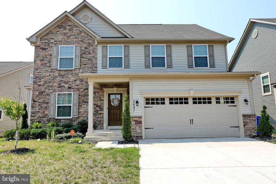 Not even 3 years old!! Beautiful 4 bedroom home with a loft and a finished basement. A number of upgrades were done when this home was built in 2018. When you enter the home from a quaint porch, you will walk into a wide foyer with a formal living room to the left that connects to a separate dining room. The kitchen has a double oven, gas stove, large island with pull-out shelves in the cabinets and granite countertops. There is hardwood flooring in the foyer and into the kitchen. It is an open floor plan with a large family off the kitchen with a gas fireplace. The office next to the family room is perfect for studying or working from home.  Upstairs is a spacious primary  bedroom with 2 walk-in closets. A bright and open loft is situated between 2 bedrooms with another bedroom down the hall. No more lugging laundry up and down the stairs with the laundry room upstairs next to the loft. Moving down to the basement, there is a large multi-purpose room with a full bath and a theater room. And plenty of storage with 2 separate unfinished storage rooms.