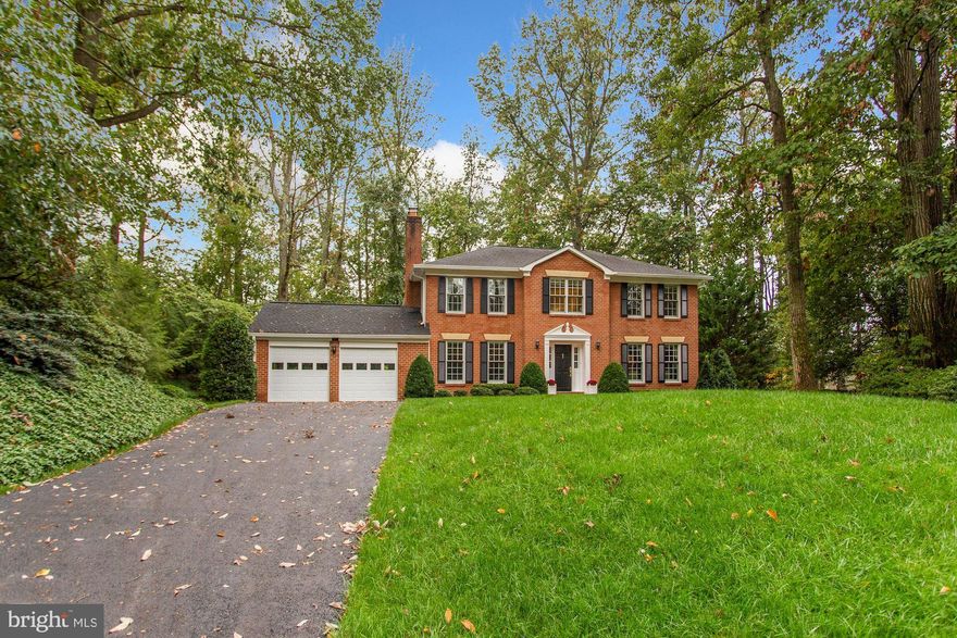 Updated colonial in the highly sought after neighborhood of Wolf Trap Woods in the Langley High School Pyramid. This brick front home is sited on a lush 0.38 acres with mature landscaping and a large rear deck with gazebo. Natural light abounds throughout the main level with foyer entry, formal living & dining rooms, powder room, gracious family room with fireplace, a beautifully renovated Kitchen with eat-in area and deck access. Upper level with 4 spacious bedrooms and 2 full bathrooms. The Primary Bedroom boasts a fireplace and a renovated en-suite bathroom with overhead shower with tub. Lower-level encompassing large recreation room, den, bath and large utility area with storage. Recently repaved driveway and resurfaced 2 car garage with main level access. Convenient access to beautiful walking trails, Route 7, the Dulles Toll Road, Tysons Corner, McLean & Reston. Mclean Schools! (Warning- please do not enter property without an appointment, as the property has an alarm when there are no scheduled showings)
