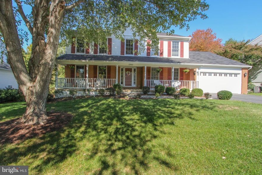 Move-in Ready! Spacious 4 bedroom col backing to woods. Welcoming front porch, quiet rear deck, walkout lower level.  Soaring 2 story entry, 1st floor office, formal living & dining. Large kitchen w/breakfast bar & nook. Double gas oven, walk-in pantry, granite counters & hardwoods. Cathedral ceilings in family room, w/slider & gas FP. Updated master bath w/large walk-in shower. Fin basement.