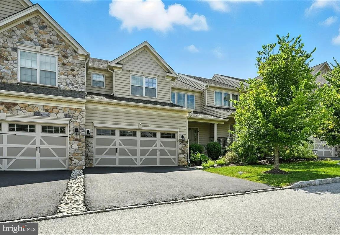 Chester Springs- 'Byers Station" Excellent opportunity to live in this huge well maintained 4,200+- sq. ft. home located in the highly coveted Byers Station community of Chester Springs, nestled in a secluded area of the community. Very spacious open floor plan so one can choose their own personal layout of the home. 2 Story featuring Entry, Livingroom dining area combined with a gourmet E/i Kitchen with plenty of space for bar stools. Granite counters, steel appliances and a white cabinet kitchen to enhance the natural sunlight. Plenty of cabinet space, Family room area with access to a maintenance free rear deck with secluded views. Main floor powder room inside access to the 2-car garage equipped with electric charging for EV's. Main floor hardwood flooring. 3 total bedrooms and 3.5 bathrooms, including two main suites one on the main floor and another on the 2nd floor offering the perfect layout for multigenerational living or hosting guests. This home also features a wide-open finished basement equipped with a bar, excellent for recreation, workout space if one desires. Plenty of opportunity to enjoy separate relaxation from the rest of the home. Folks in this community can enjoy resort-style community amenities such as a fitness center, swimming pool, tennis, basketball, and scenic 5-mile walking trail, all designed for comfort and an active lifestyle. This property offers the perfect blend of luxury, convenience, and tranquility an exceptional rental opportunity in one of Chester Springs' most sought after locations. Easy access to shopping, and all major roads. Pets determined on a case-by-case basis- and possibility of waived pet fees/deposit. 1/2 a month's credit to future rent for a lease signed on or before 10/1/25. Please only inquire if you meet the minimum requirements for this rental- total gross monthly household income at least 2.5X the monthly rent, credit score at least 650+and at least 2-3 month's rent up front at signing the lease.