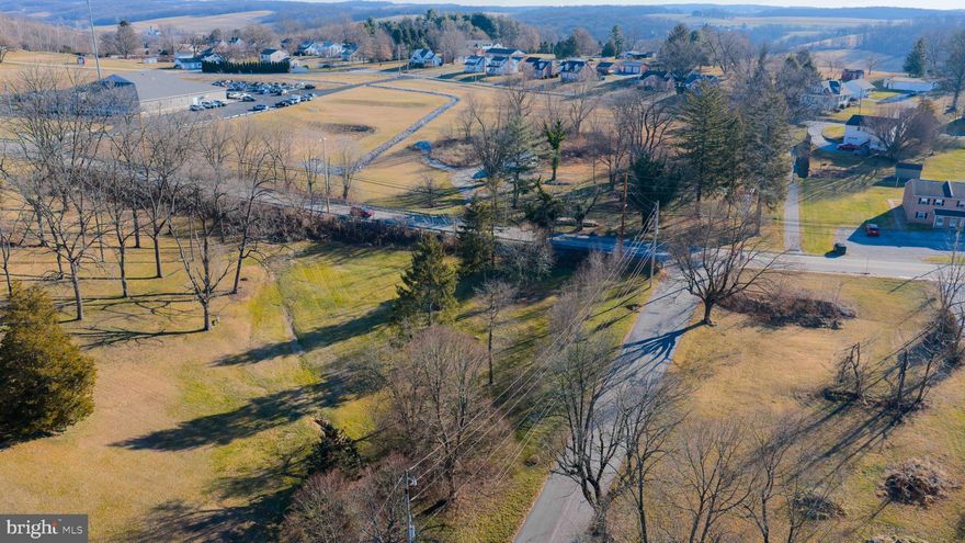Bring your own builder and make your home dreams come true on this corner lot in the Dallastown School District. Nearly an acre with public utilities available.  Sewer line reservation already in place and paid for. Park like setting with easy commute to PA/MD line, I-83.  Just minutes from Lake Redman and Lake Williams where you can enjoy boating, fishing, and miles of hiking trails. Modular and mobile homes on a foundation are permitted. No water tap fee.