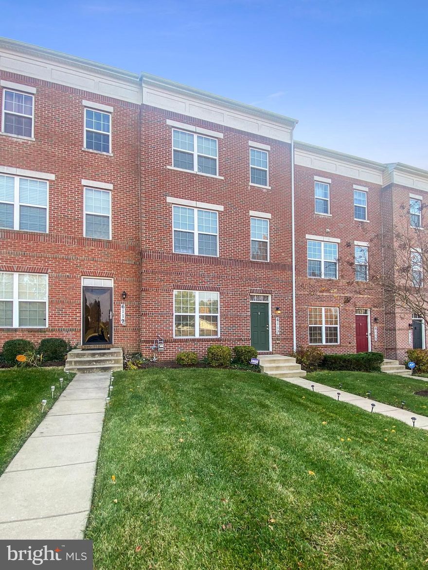 Outstanding opportunity on this luxury garage townhome!  Very desirable location - easy access to all commuter routes, shopping, dining and walking distance to Addison Metro Station!  This brick front home is only 10 years young and is loaded with all the features you could desire.  The main level has hardwood floors in entry foyer, main level family room, half bath and door to a two-car garage.  There is an automatic garage door opener and additional parking pad in front of the garage.  Up to the middle floor, there is a very spacious living room, separate dining room, gourmet kitchen, adjoining breakfast room and half bath.  The kitchen features quartz counters, 42" cherry cabinets, breakfast bar, island, black appliances, ceramic tile backsplash, hardwood floors and recessed lighting.  There are sliding doors to a large rear deck with composite decking and white vinyl rails.  The location is one of the best in the community - the front of the home does not face any other homes and the rear of the home faces open space with walking paths.  Plenty of parking in front and rear of home.  Up to the top floor of the home, there are two guest bedrooms plus a full bath in the hallway.  The primary bedroom suite is spacious and features a walk-in closet and full bath with double vanity and ceramic tile.  Nothing to do but move in and enjoy this wonderful home!!  Estate sale, but in excellent condition!  Special financing and possible grant money available - see Bright documents!