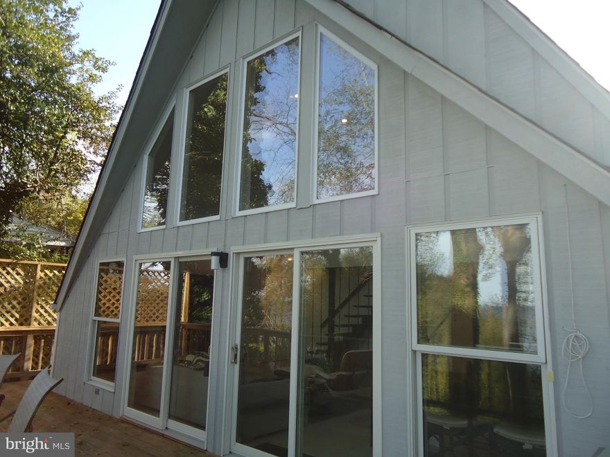 Beautiful waterfront in The Willows Colony in Chesapeake Beach.  Expansive views of the Chesapeake Bay.  Completely renovated in 2011 to include windows, kitchen, appliances, bathrooms, roof, heating, floors and more.  Kitchen and baths professionally designed by Tatari Design Center.  Enjoy steps to a secluded beach from your decks.  Enjoy your mornings sitting on the deck watching amazing sunrises.