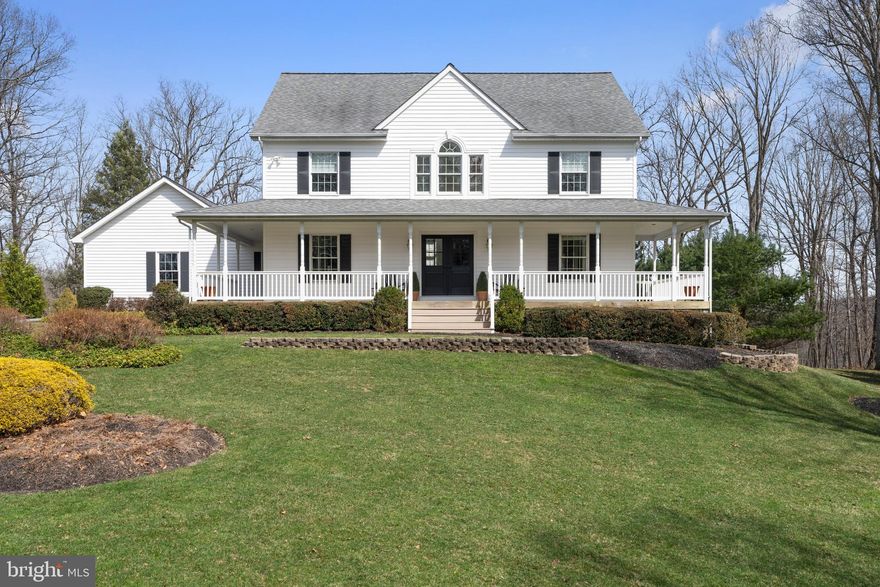 Nestled on a private wooded enclave along the Little Falls & NCR Trail, this beautifully maintained 5-bedroom colonial is in the coveted Hereford School zone. The main level features an open floor plan with a remodeled kitchen, great room with wood-burning fireplace, primary suite with renovated bath, a charming sitting room/den, powder room, and convenient laundry/mudroom. Upstairs offers four generously sized bedrooms and two full baths with abundant natural light. Dual-zone HVAC provides year-round comfort, and Xfinity internet is available.  Set down a private shared lane on nearly six acres, this serene property is just minutes to I-83 and Hunt Valley. Enjoy the wraparound porch, rear deck and patio, and professionally landscaped grounds. Cherished by its original owners, this home is now ready for its next stewards.