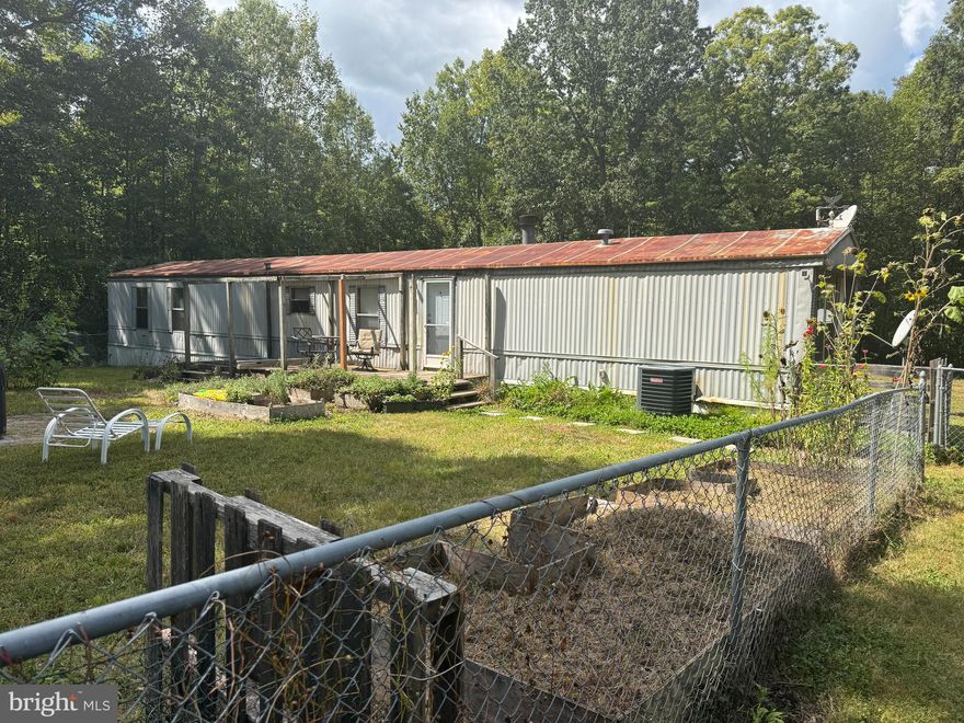 Partially renovated 3-bedroom, 2 full bathroom single-wide mobile home situated on 5 beautiful, level, and private acres in a peaceful rural setting. Property features a chain-link fenced front yard and a mix of open land and partial woods, offering privacy and room to enjoy the outdoors. Home needs TLC and is being sold as a handyman special with strong potential for the right buyer. Cash or special financing required.

Title has been ordered and will be conveyed to the purchaser before or after the sale. If received prior to sale, then the home will be fully renovated and sold for considerably more. IBTS certificate, HUD plate, HUD tag are available.