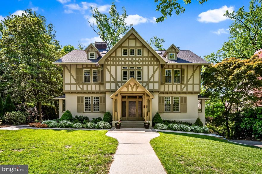 Welcome to 7 Midvale Road, an exquisite Tudor-style home located on a peaceful dead-end street in the historic Roland Park neighborhood. Meticulously renovated from top to bottom and expertly reimagined by interior designer Katherine Behrens Crosby of Crosby Jenkins Associates, this home offers a perfect blend of modern comfort and timeless elegance. Enter through the grand 24-foot entrance hall adorned with a stunning leaded glass front door, side lights, and a transom. The spacious foyer leads to a convenient powder room. The formal dining room exudes sophistication with leaded glass windows, crown molding, chair rail detailing, and an elegant chandelier. The living room mirrors this charm flowing seamlessly into the family room, which features a working fireplace with a stone hearth and wood mantle. The family room opens directly into the gourmet 20-foot eat-in kitchen, where exposed beams, quartz countertops, a subway tile backsplash, and a center island with leathered black granite steal the spotlight. Outfitted with GE Monogram appliances, a farmhouse sink, ample cabinetry, and a large butler’s pantry with quartz countertops and a separate pantry closet, this kitchen is designed for both beauty and function. Six Marvin windows flood the space with natural light, while heated floors make for an ideal morning retreat. The adjacent breakfast room/sunroom, with its nine windows, offers additional access to the expansive Trex deck. A combined mudroom/laundry room with heated flooring, cubbies, a GE washer and dryer, two large storage closets, and side porch access rounds out the first floor. Ascend to the second floor where you’ll find three generously sized bedrooms. The 27-foot primary suite boasts a cozy working fireplace, a sitting area, and two walk-in closets. The luxurious primary bath features heated marble floors, a double vanity with Calacatta gold marble, and a large Calacatta marble-tiled shower with a rain showerhead and body sprays. The second bedroom includes two double closets and a built-in desk, while the hall bath offers heated Carrara marble floors, a double vanity with a quartz countertop, a spacious Kohler tub, and a subway-tiled glass shower. The third bedroom enjoys ample natural light from picture windows, along with a double closet. The guest full bath comes with marble flooring and a subway-tiled shower stall with Carrara marble flooring. The third floor houses three additional bedrooms and one full bath. The fourth bedroom is a spacious 19-foot retreat, featuring a walk-in closet, three skylights, and a Daikin mini-split AC system for comfort. The fifth bedroom measures 21 feet and includes two skylights and multiple closets. The sixth bedroom, ideal as an office, offers two skylights and a built-in desk. The full bath on this level features heated Carrara marble floors, a vanity with a quartz countertop, and a glass shower stall with penny tile flooring. A high-velocity AC system efficiently cools the second and third floors.
The finished lower level offers additional living space with an exercise room with picture windows, rubber flooring, and a split system for heating and cooling. The expansive 31-foot recreation room is perfect for gatherings, complete with carpeting and recessed lighting. A second laundry room includes tile flooring and laundry tubs, while a fifth full bath features heated tile floors, a quartz-topped vanity, and a walk-in shower. A Rheem AC system cools both the first floor and lower level.   The exterior is equally impressive with custom walkways, attractive landscaping, and a private rear play yard. The driveway accommodates multiple cars, offering added convenience.  This home is located just a short walk from schools, the Enoch Pratt Library, Eddie’s, Starbucks and other local amenities.  Whether you're hosting or simply enjoying a quiet evening at home, the refined updates make this property an exceptional retreat in one of the city's most sought-after locations.