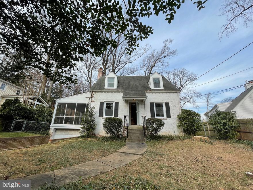 Within Walking Distance of NIH & Approx a Mile to Walter Reed and Suburban Hospital** Home features wood floors,  Main level features an en-suite bedroom, living room with wood-burning fireplace, dining room, kitchen and a screened-in porch. Upper level features 2 bedrooms and a full bath.